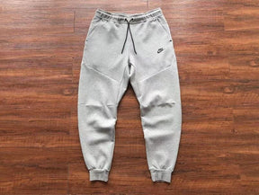 Calça NK Tech Fleece Cinza