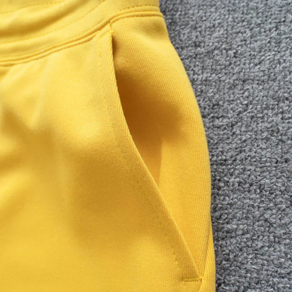 Conjunto NK Tech Fleece Amarelo