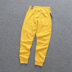 Conjunto NK Tech Fleece Amarelo